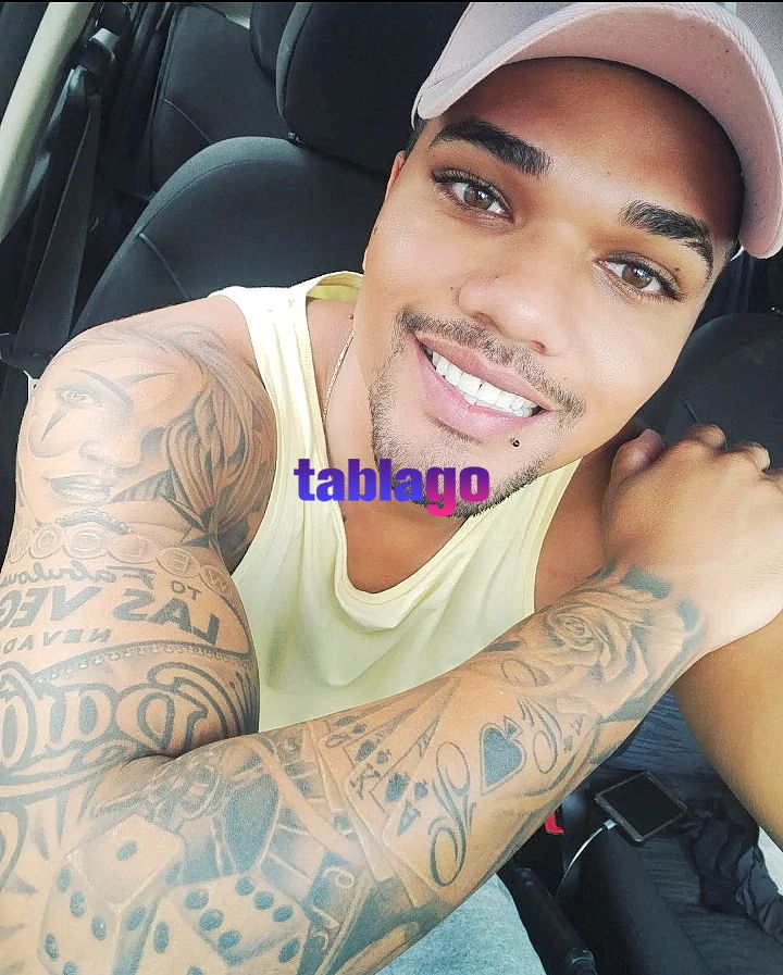 Menino Mulato tatuado