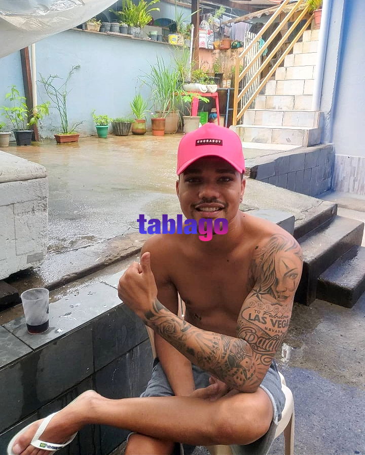 Menino Mulato tatuado